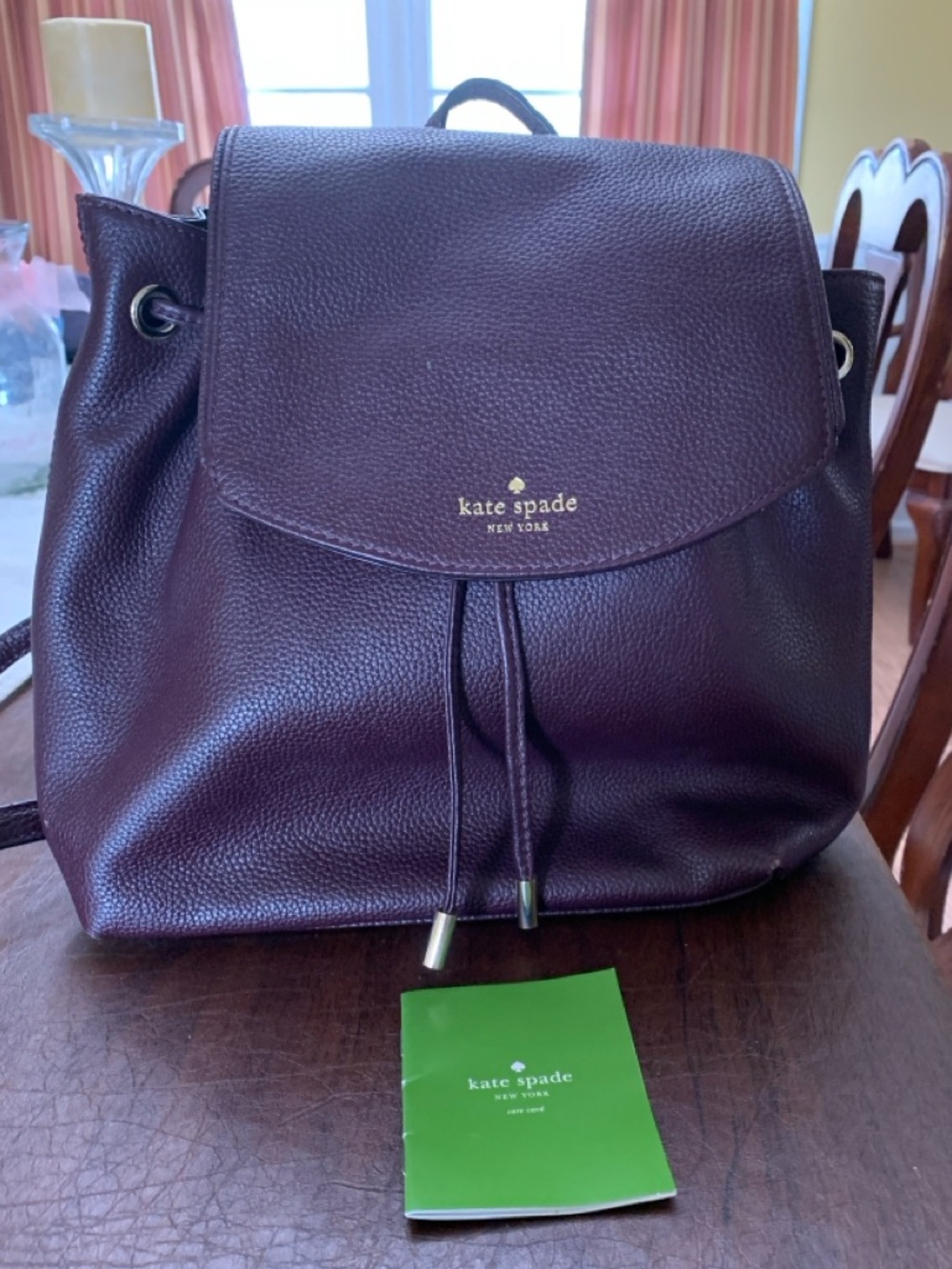 kate spade Pebbled Leather Drawstring Backpack in Deep Plum - Picture 1 of 6